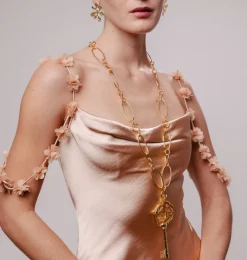 Pendentif doré Clé