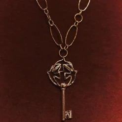 Pendentif doré Clé