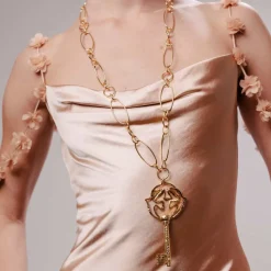 Pendentif doré Clé