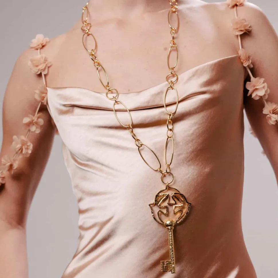 Pendentif doré Clé